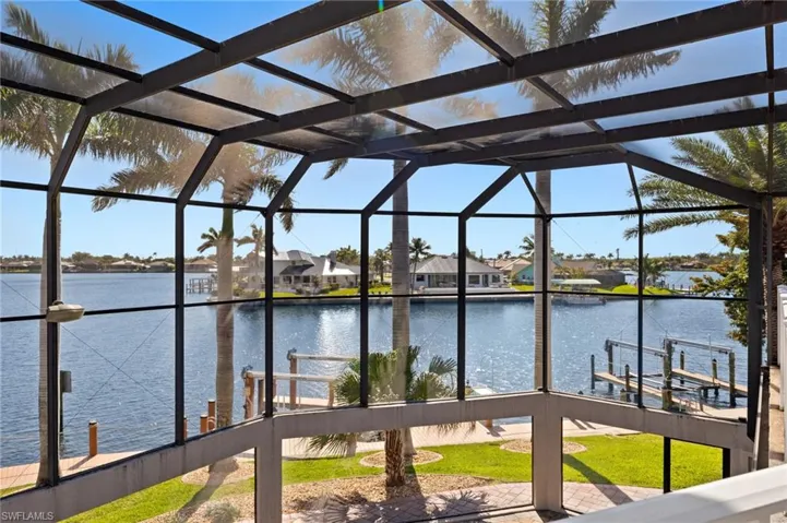 Dock area featuring a residential view and a water view