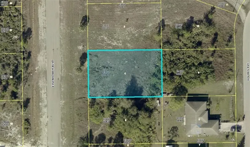 Aerial overview of property's location featuring property parcel outlined