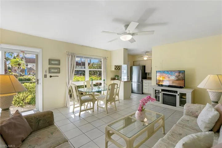 Tiled living room with ceiling fan