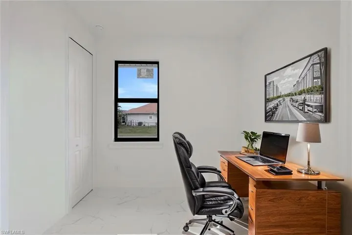 Office space featuring marble finish flooring