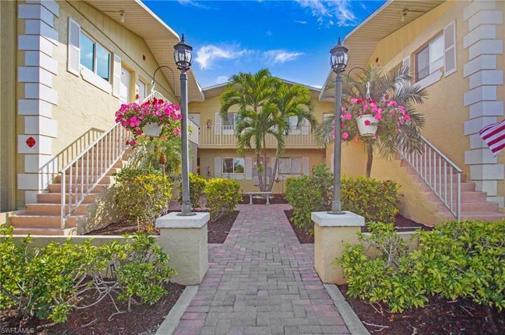 The beautifully maintained courtyard welcomes you and your guests to the most private corner end unit in the building!