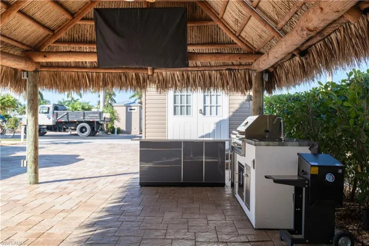 View of patio / terrace featuring exterior kitchen