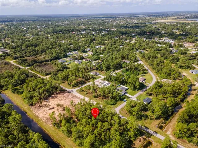View of property location with a nearby body of water