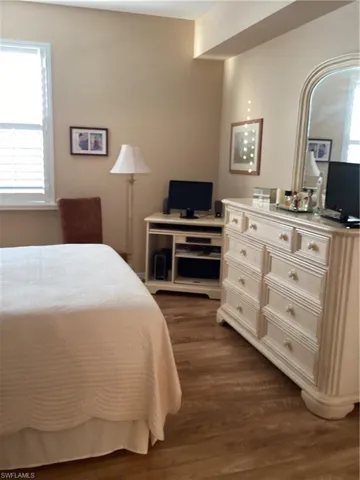 Bedroom featuring dark hardwood / wood-style floors