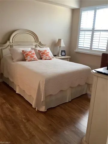 Bedroom featuring dark hardwood / wood-style floors