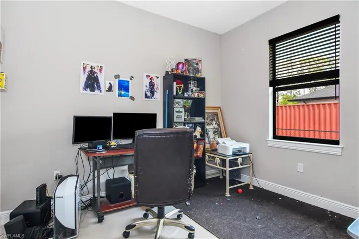 Home office featuring baseboards