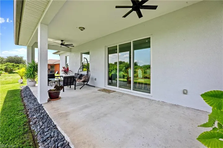 View of terrace featuring ceiling fan