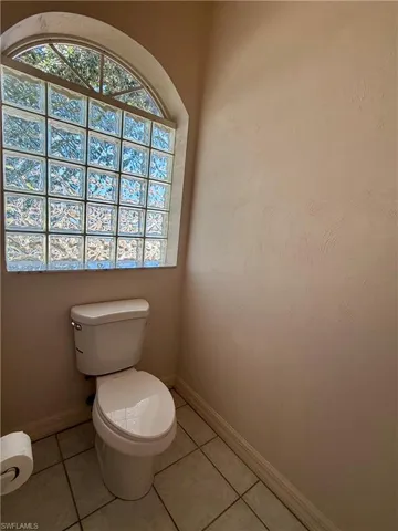 Private toilet in master.