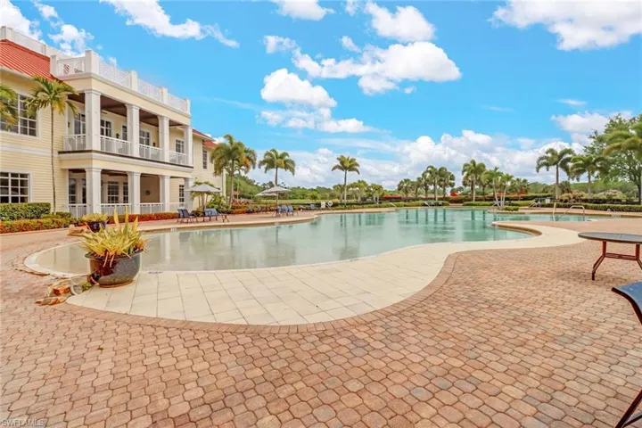 Community pool featuring a patio area