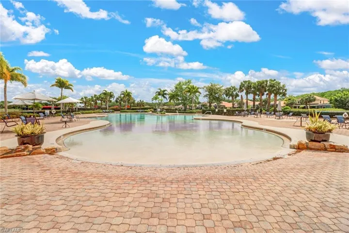 Community pool with a patio area
