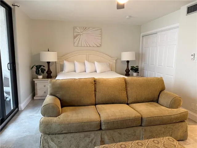 Bedroom with a closet and ceiling fan