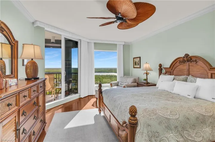 Bedroom featuring access to exterior, crown molding, ceiling fan, and hardwood / wood-style flooring