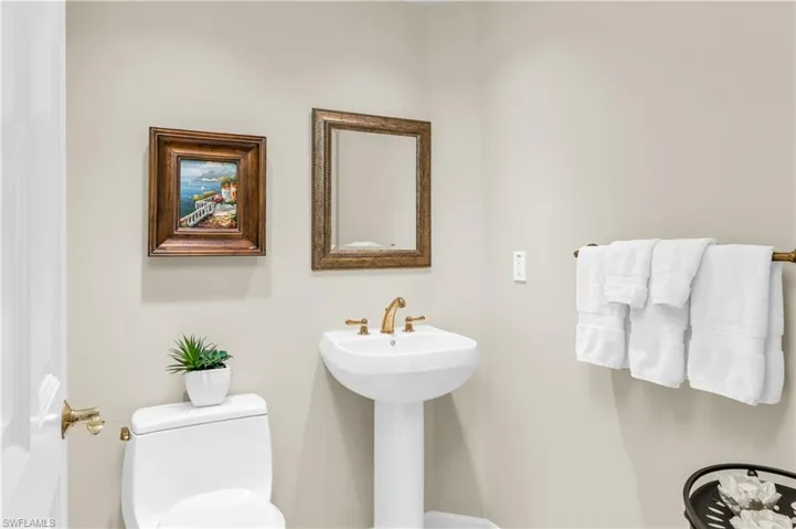 Bathroom featuring sink and toilet
