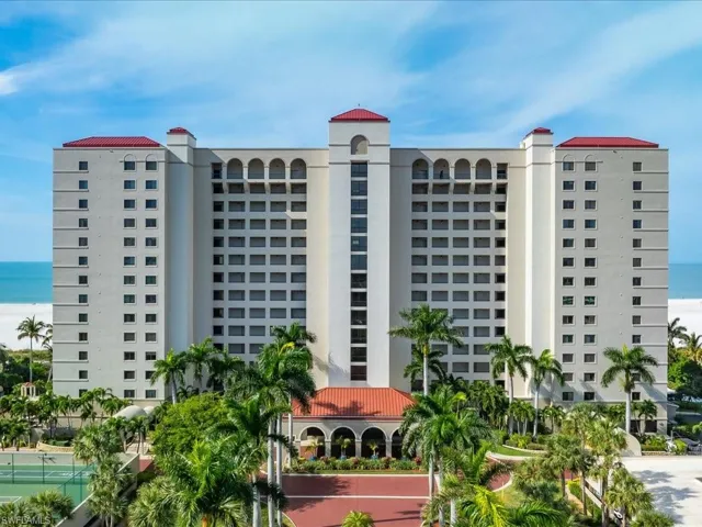 View of apartment building / complex with a water view