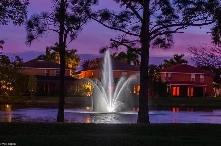 View of community with a water view
