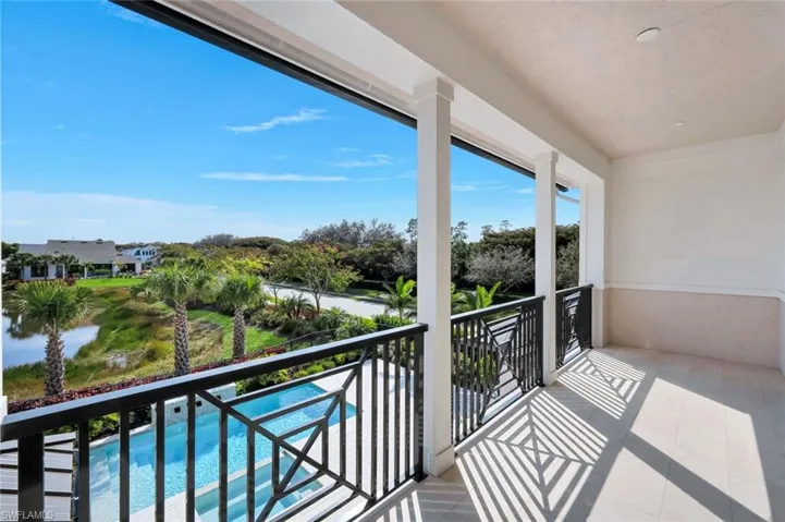 Balcony with view of pool area