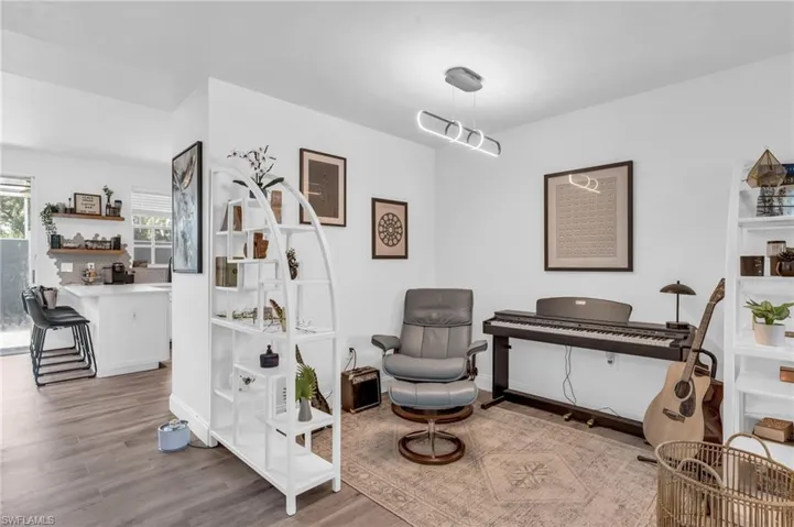 Sitting room featuring light hardwood / wood-style floors