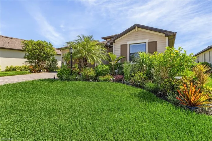 View of front of home featuring a front lawn