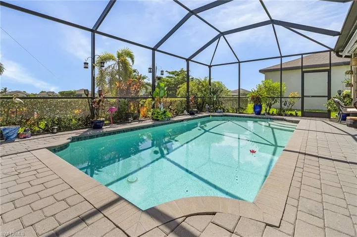 View of pool featuring a lanai and a patio