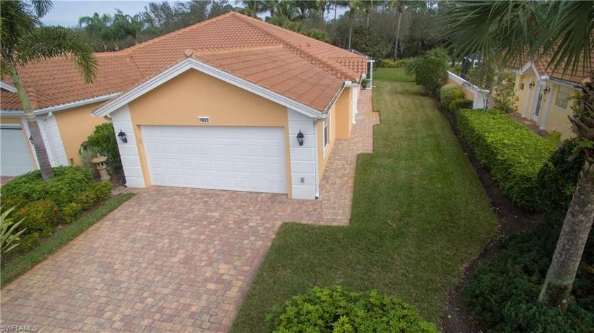 Front of home, easement lot, and newer roof!