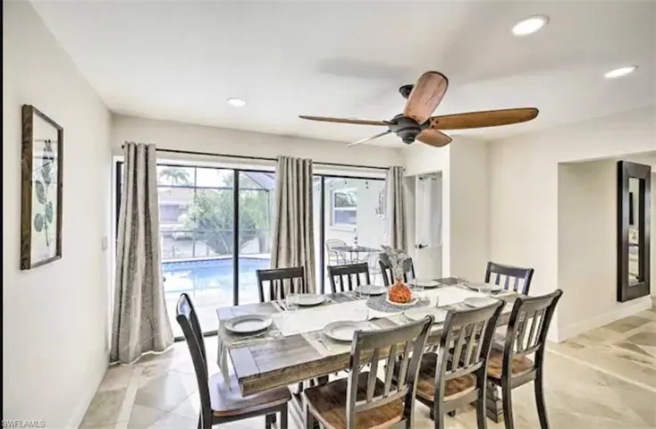 Dining space featuring baseboards and recessed lighting