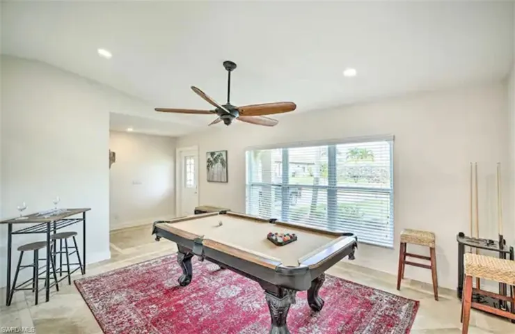 Rec room with billiards table, ceiling fan, and recessed lighting
