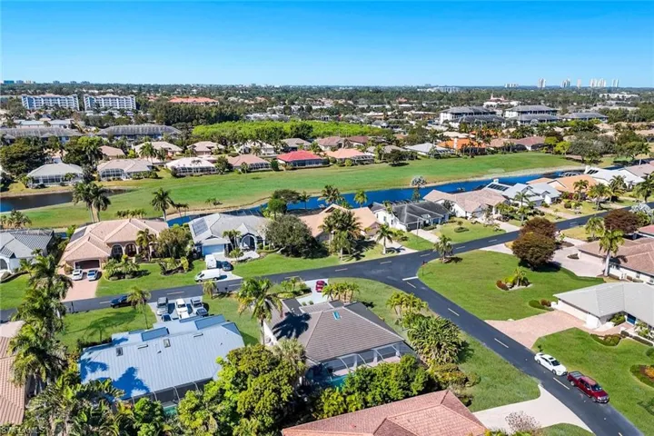 Aerial overview of property's location featuring a nearby body of water