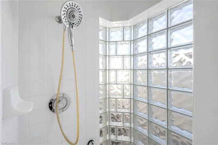 Full bath with a tile shower