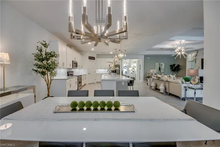Dining space featuring an inviting chandelier