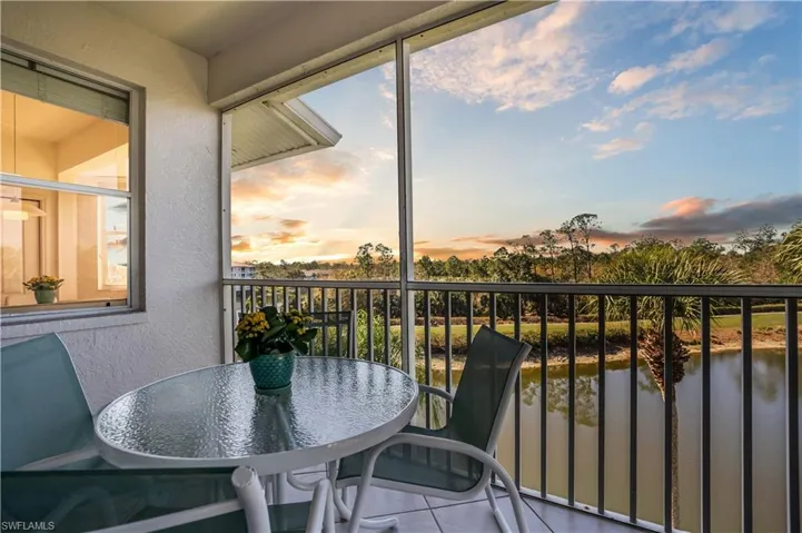 Balcony at dusk with a water view