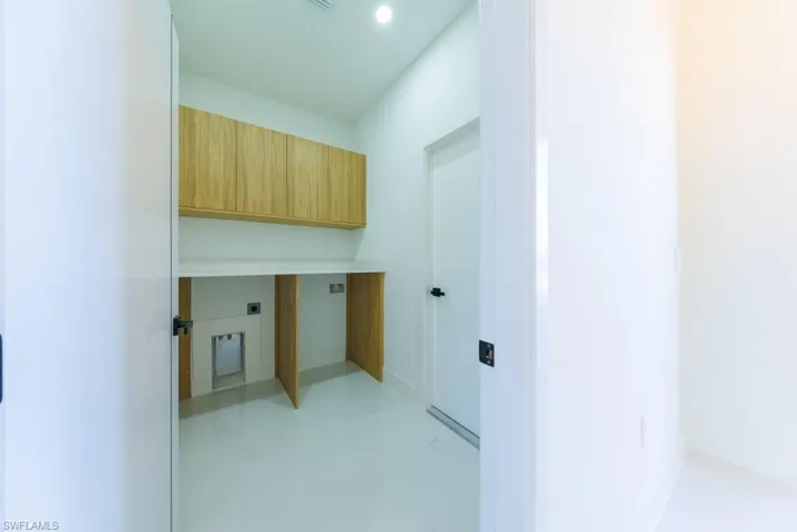 Washroom with hookup for an electric dryer