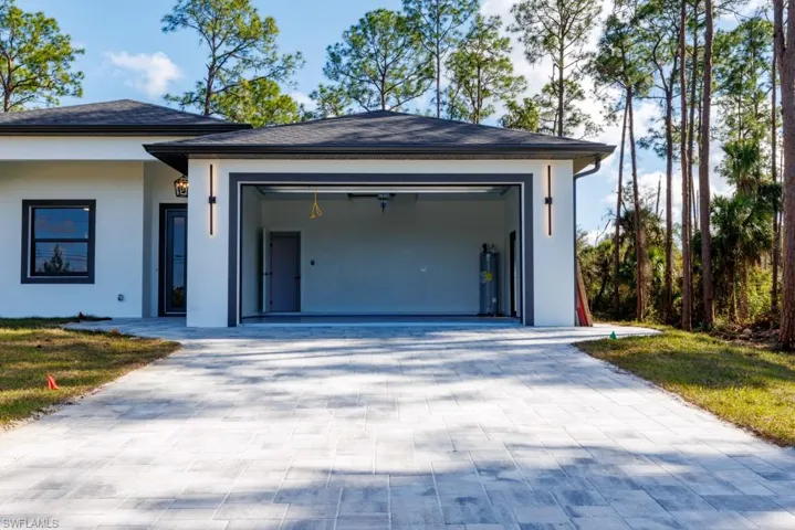 Garage with decorative driveway