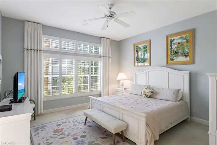 Spacious Master Bedroom on main floor with Plantation Shutters