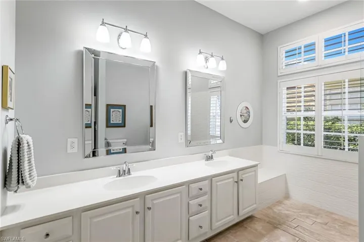 Master Bath on Main Level - Dual vanities, large open space -- preparing for the day ahead will be a pleasure! Plenty of room for two!