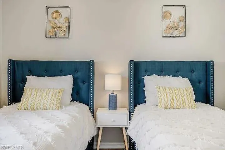 Tufted velvet headboards with nailhead trim