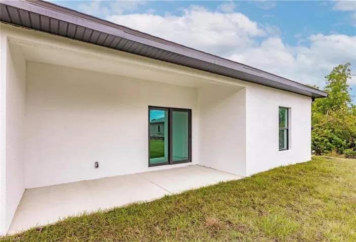 Rear exterior with covered patio