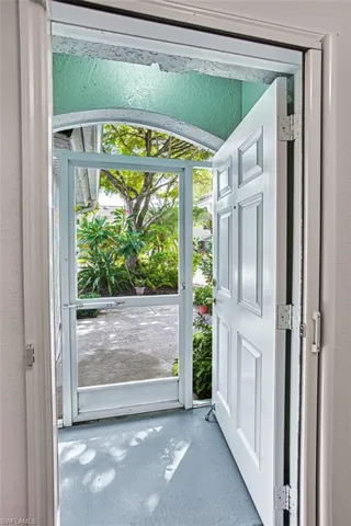Front entrance with screened enclosure