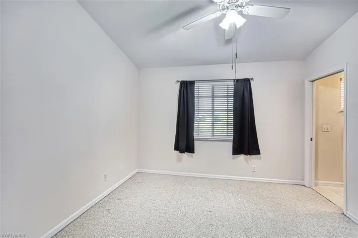 Bedroom featuring Berber carpet and a ceiling fan