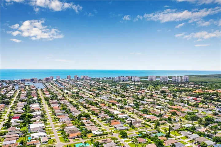 View of urban area with a nearby body of water and nearby suburban area