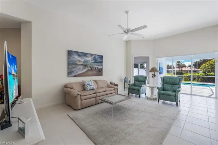 Tiled living room with ceiling fan