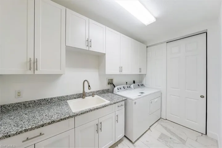 Granite Counters, Built-In Cabinets, Washer/Dryer
