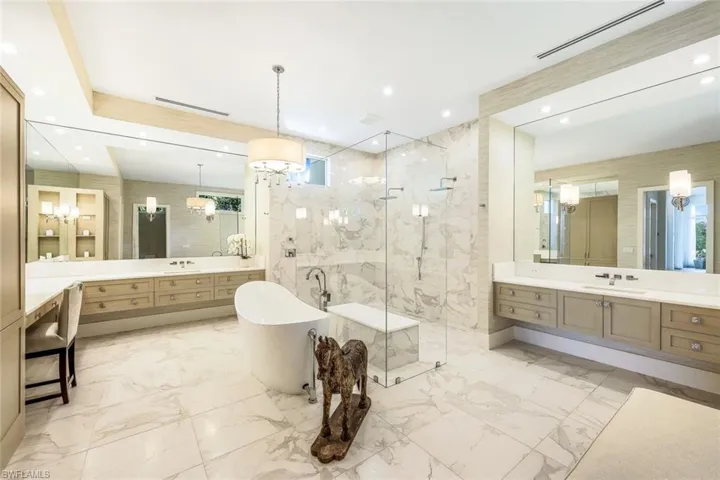 The primary bathroom is the perfect size for two!