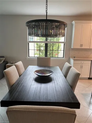 Table and chandelier elegance, illuminated