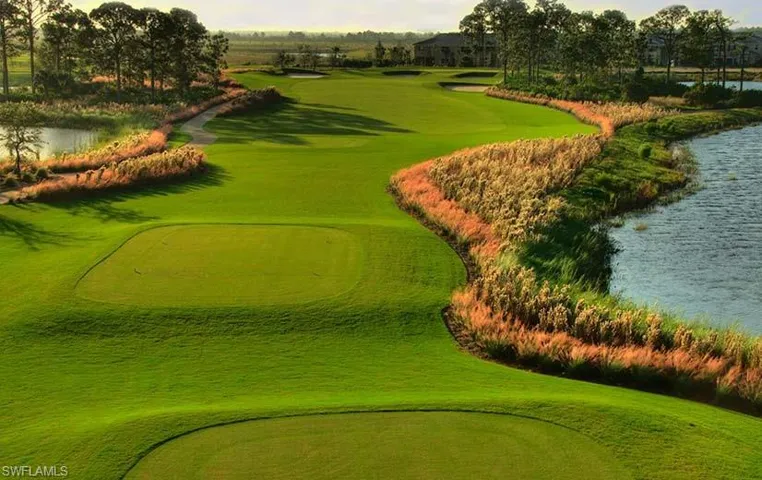 View of home's community featuring a water view and golf course view