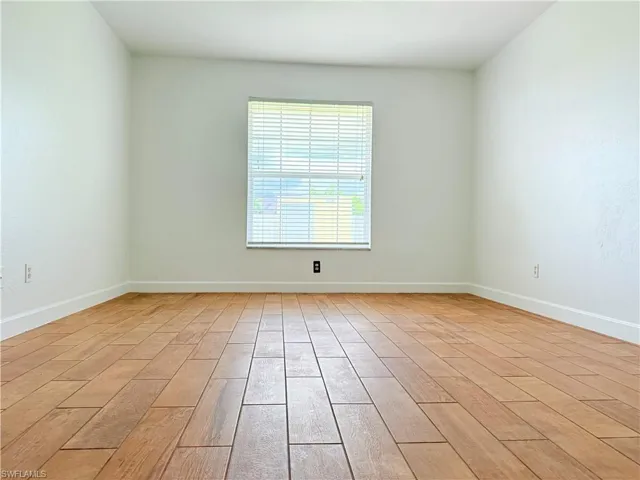 Empty room featuring light wood-style floors