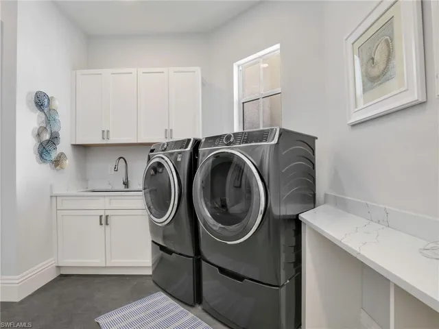A spacious well designed laundry room