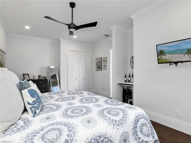 Walk in closet with beverage cooler to welcome your guests!