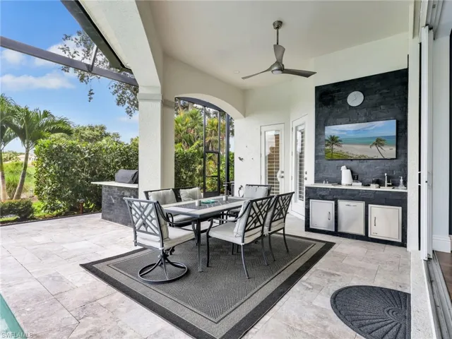 a Built in grill, kitchen and plenty of room for a dining table