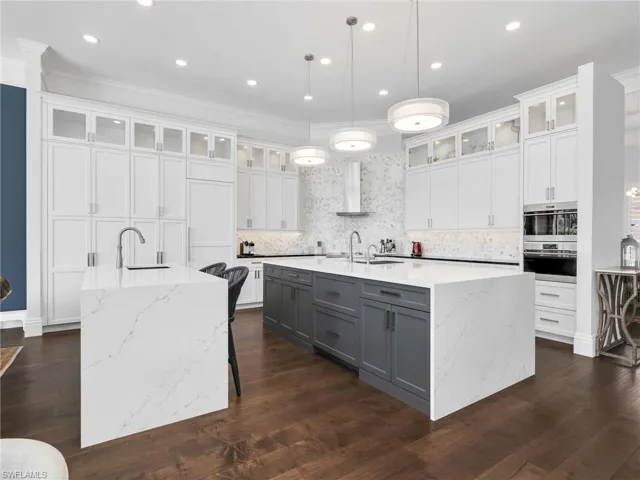 Top of the line Kitchen with Wolf appliance including a steam oven , built in sub zero refrigerator, 2 beverage drawers and 2 freezer drawers .