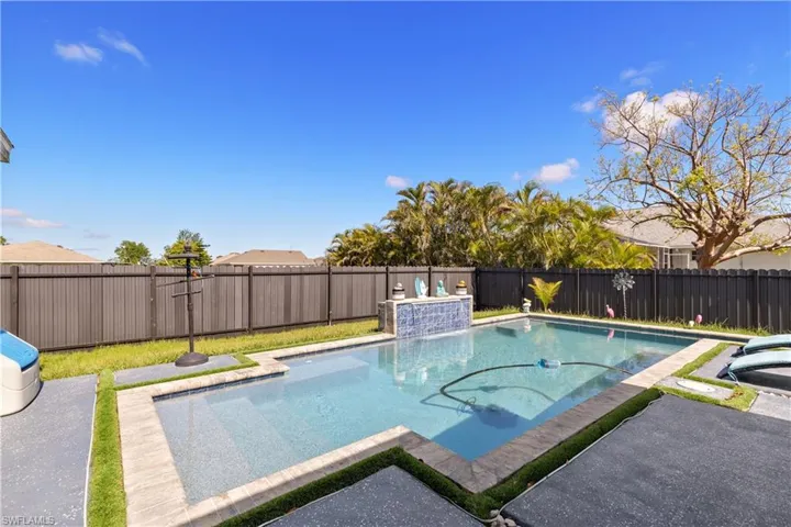View of pool featuring a fenced backyard